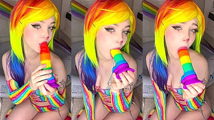 naughty onlyfans model Sneesnaw sucks on a colourful dildo