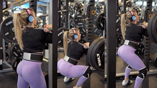 sexy onlyfans model  Kristin Pope lifting a heavy dumbbells