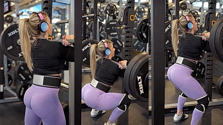 sexy onlyfans model Kristin Pope lifting a heavy dumbbells