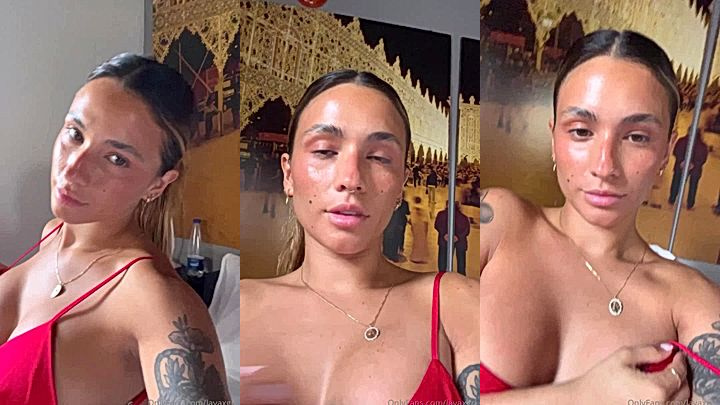 onlyfans model Lavaxgrl grabs her boobs in lingerie
