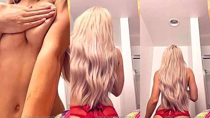 sexy onlyfans slut Molly Eskam grabbing her tits and flashing her curves in your face