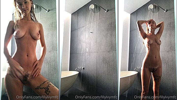 hot model Lily Ivywith huge tits running her hand across her skin slowly