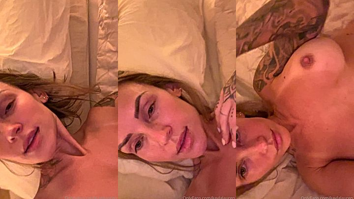 naughty onlyfans model Kayla Lauren rubs big tits on the bed