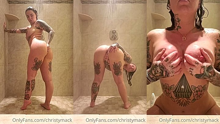 onlyfans model Christy Mack fingers her coochie in the shower and rubs big tits