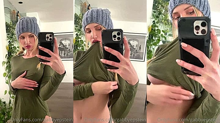 onlyfans model Gabby Epstein rubs her huge tits in a mirror video