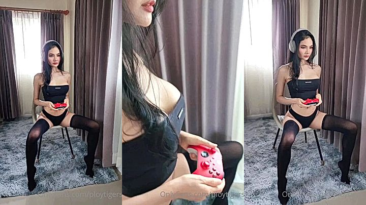 onlyfans model Ploytigerstam plays a video game in lingerie