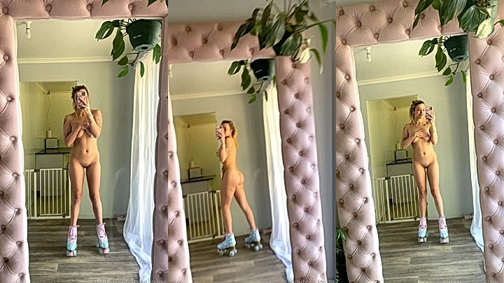 big boobs model Bree Louise shows off her massive tits in the mirror