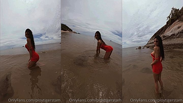 model Ploytigerstam poses and have fun on the beach