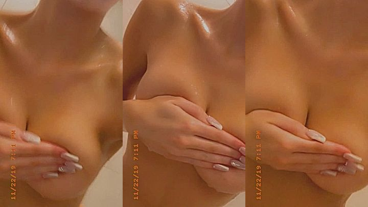 naked onlyfans model Molly Eskam grabs her big tits in this video and slowly rubs her clits