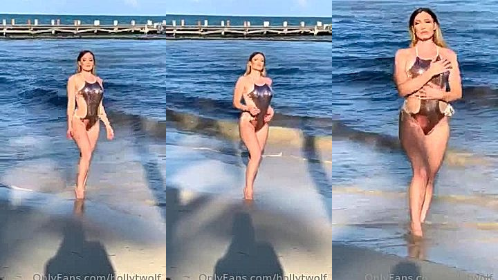 gorgeous stepsis Holly Wolf standing on the beach onlyfans