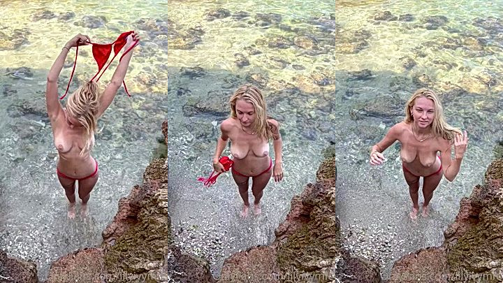 hot babe Lily Ivy remove her red bikini on the beach and show her big boobs