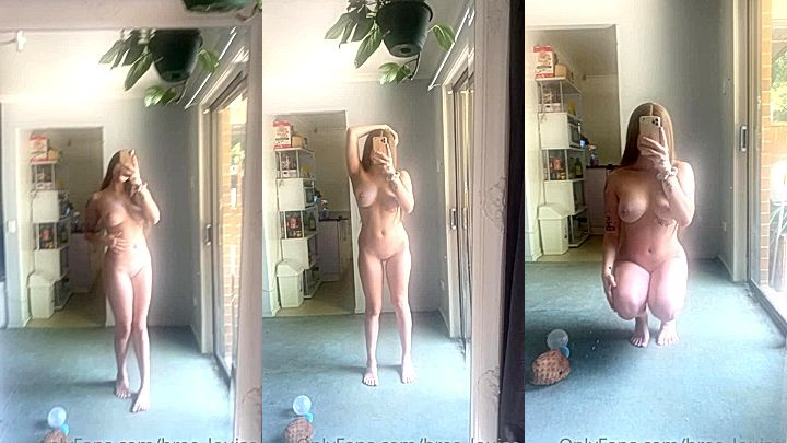 naked slutty bitch Bree Louise shows her huge tits in the mirror