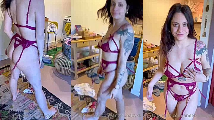 hot chick is having a great time showing off her body in her sexy wine lingerie