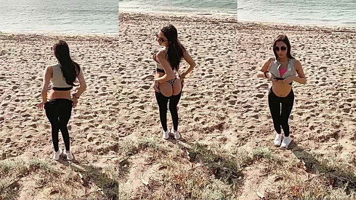 dirty slut Gianna Dior undress and tease her body while standing on the beach