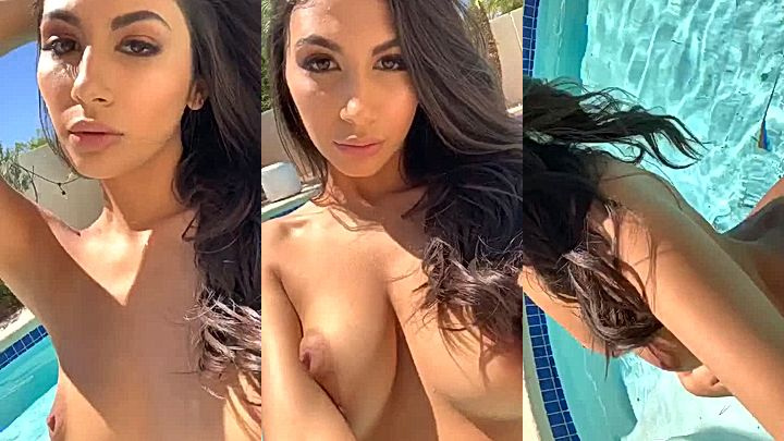 sexy onlyfans model Gianna Dior grabs her big tits in the pool