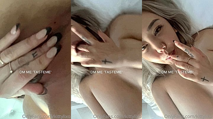 Kittylixo is having a good time touching her boobs