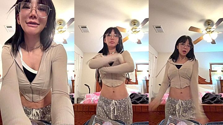 Kittylixo lifts up her dress to show off her amazing boobs