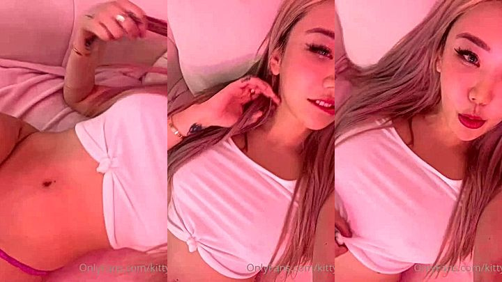 sexy chick takes off her shirt to show off her amazing body
