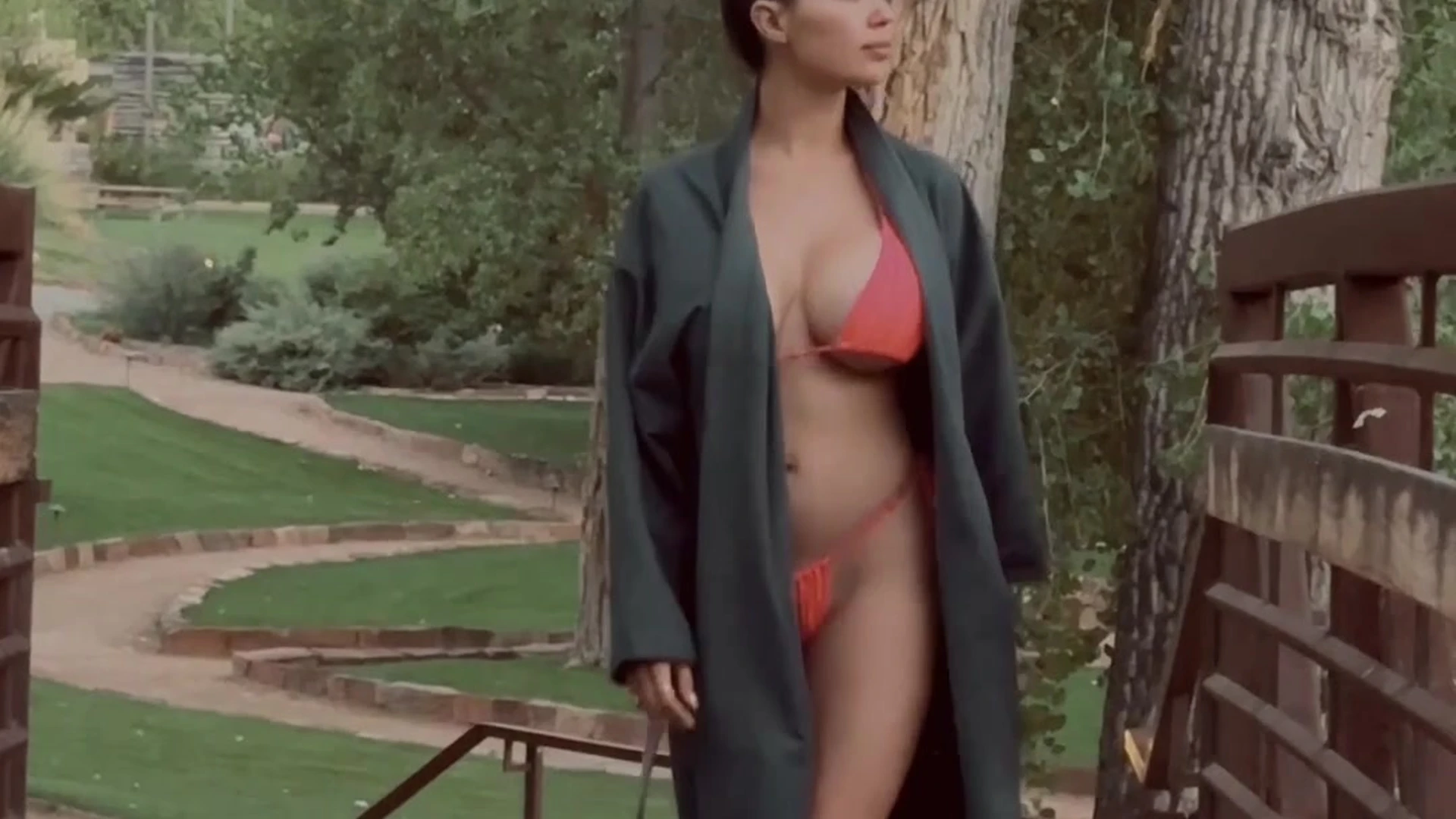 busty babe Marisol Yotta walks around the park naked