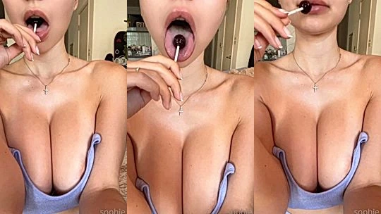hot sexy horny bitch Sophie Mudd  licked lolipop in a seductive way while showing her massive clevage