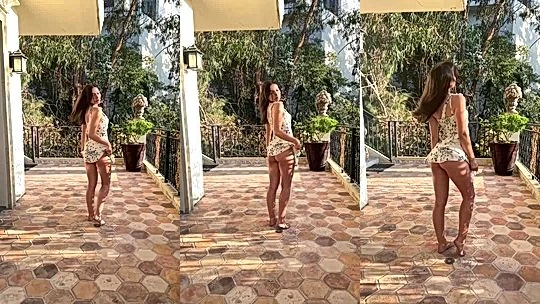 Sophie Muddishaving a great time walking outdoor showing off her amazing butt