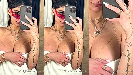 naughty hot model caresses her massive boobs in this mirror selfie video