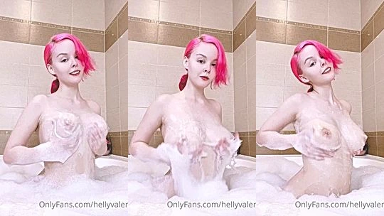 hot chick is having fun naked in the shower