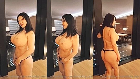 Anri Okita takes off her robe to show off her anazing boobs