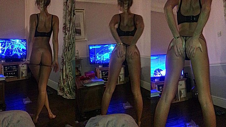 hot chick Frances Bentley tands tall and rubs her big booty and show off her sexy curves