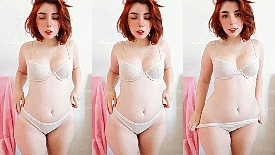 redhair onlyfans model Defiantpanda  rubs and fondles her natural big tits