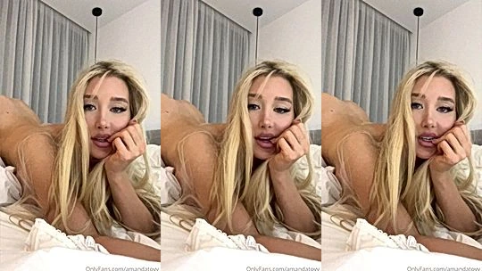busty onlyfans model Amanda Toy kneel on bed and  shows her naked……..