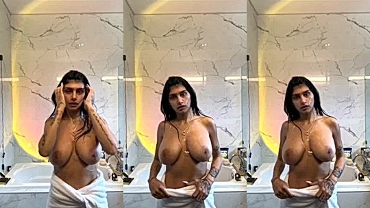 freaky naughty hot arab babe Mia Khalifa in teh bathroom playing with her massive big boobs on camera
