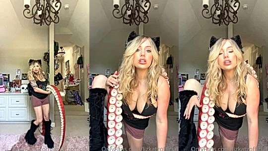 Liz Katz opens her legs widely to show off her amazing body to her fans