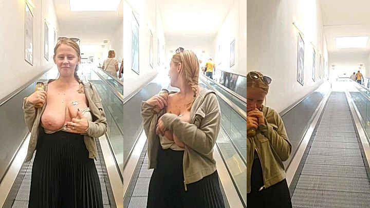 sexy onlyfans model PolaRainbow flashes her big boobs on the escalator