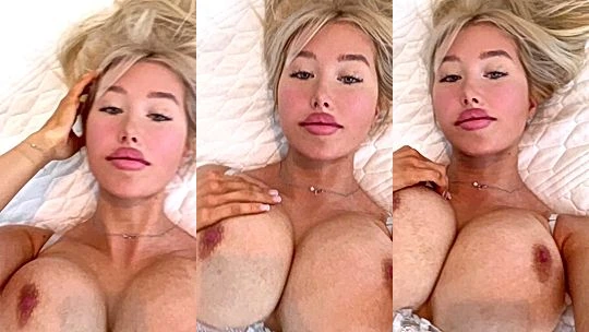 naughty bad onlyfans model Amanda Toy lays on bed and fondles her tits