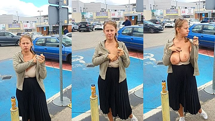 big tits model PolaRainbow flashes big boobs in the parking lot