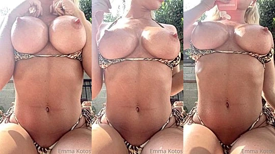 sexy onlyfans model Emma Kotos rubs and fondles her natural big boobs