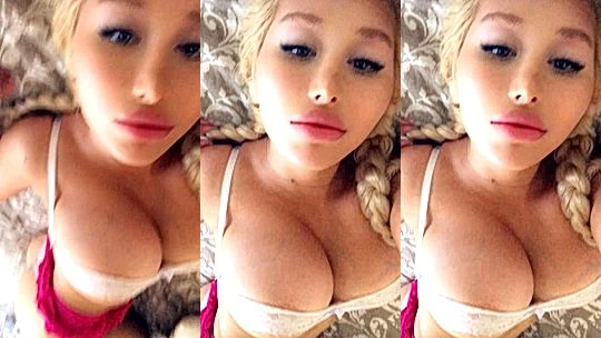 blond onlyfans model Amanda Toy lays on bed…. hertease,lingerie natural big tits