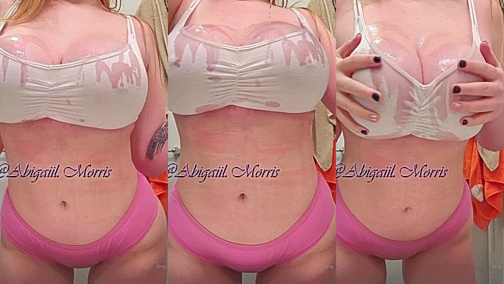 hot sexy slut  Abigaiil Morris rub her oilled big boobs hard in this video