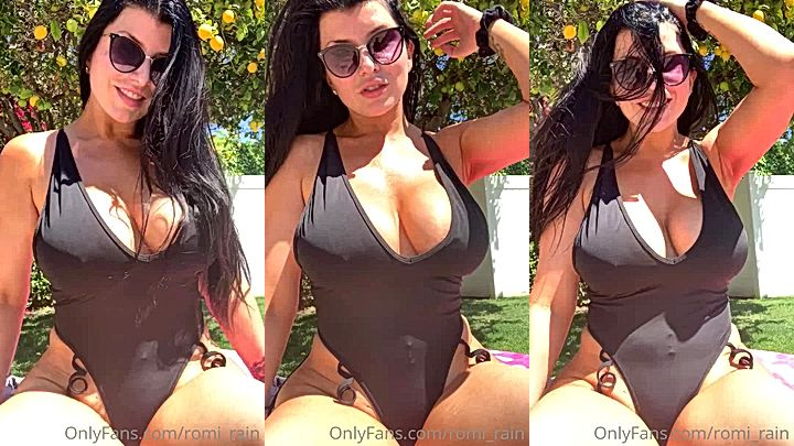 Romi Rain in black swim suit showing off her sexy curves