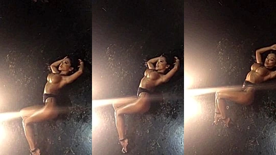 sexy big tits model CJ Miles shooting sexy pictures and getting water sprayed all over her
