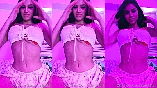 sexy latina Bri Adeline teases you with her tits in her bedroom