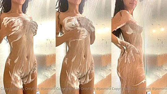 indian onlyfans model  Jasminxtakes a shower and rubs her big ass and huge tits