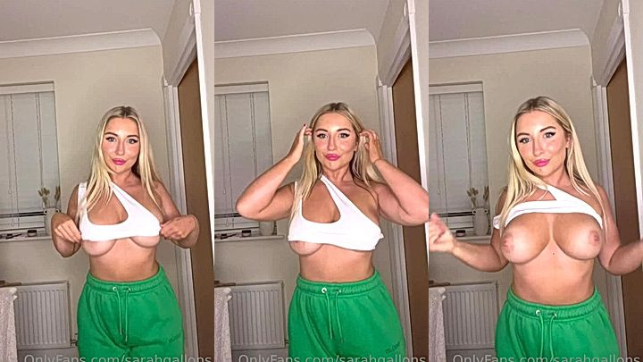 slutty bitch Sarah Gallons lifts up her shirt to show her huge boobs to her subscribers