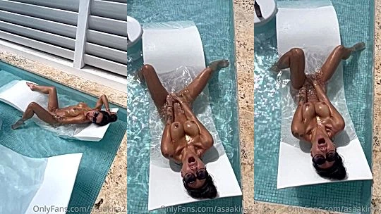 horny Japanese milf Asa Akira gets horny in the pool and fingered herself