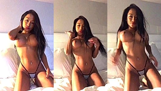 sexy horny big tits chick CJ Miles playing with her boobs on the bed