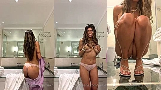 nasty hot Mia Khalifa took off her silk gown squeeze her huge soft tits adn show off her soft curves