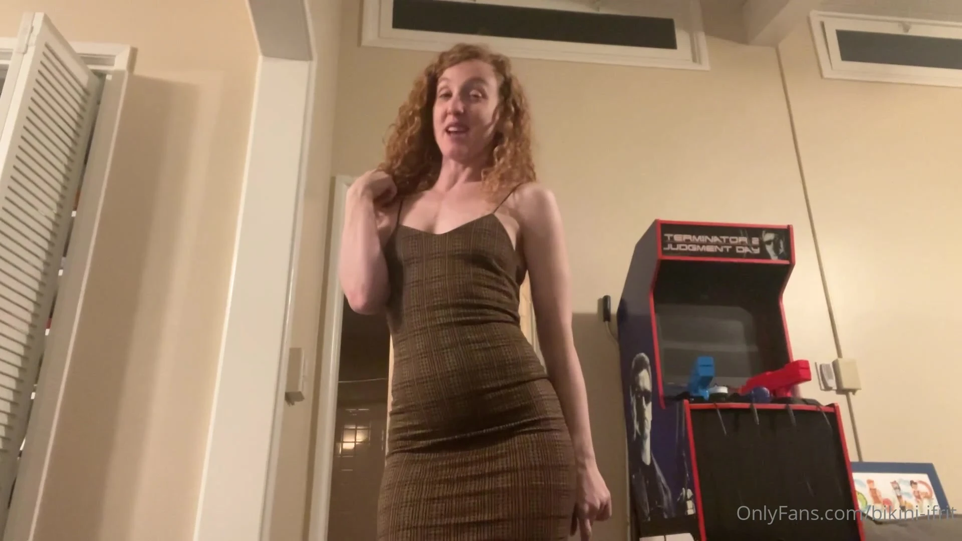 curly red hair onlyfans model talk dirty and shows her big tits in lingerie