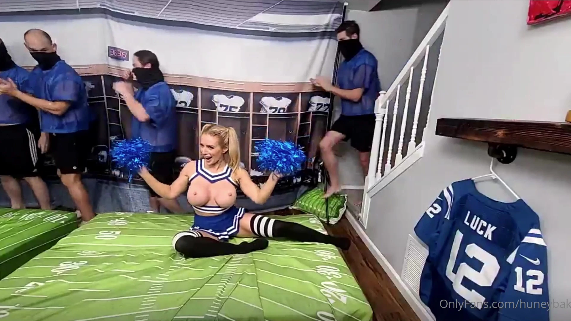 hot chick is dressed as the cheerleader and undressed to show off her amazing biody