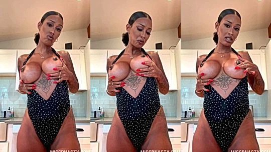 american onlyfans model MissBNasty takes of her lingerie and rubs her big tits slowly